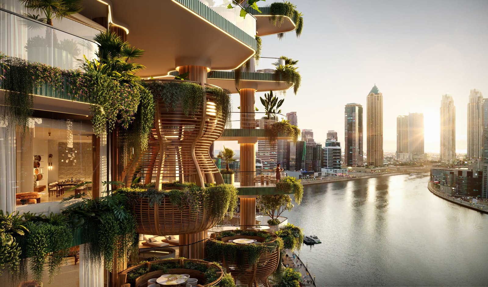 EYWA facade with hanging gardens over the Dubai Canal at sunset